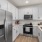 Well-lit kitchen with ample counter space