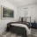 Bedroom with natural lighting and high ceilings