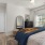 Bedroom with natural lighting and high ceilings
