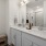 a well-lit bathroom with a vanity