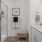 a spacious bathroom with a vanity
