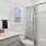 a bathroom with a shower and sink