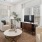a living room with a tv and couches