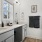 a bathroom with a mirror and sink