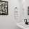 a bathroom with a mirror and a sink