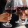 a person holding a glass of wine